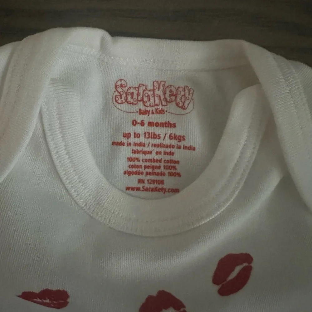 SARAH KETY BABY BODYSUIT
